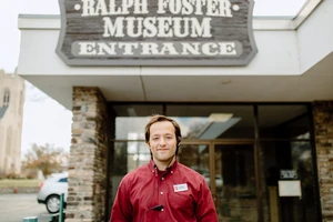 picture of student in from of museum entrance